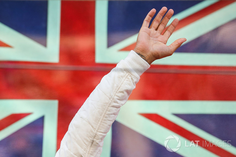 Lewis Hamilton, Mercedes AMG F1 celebrates on the podium and waves