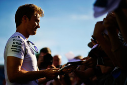 Nico Rosberg, Mercedes AMG F1 signs autographs for the fans