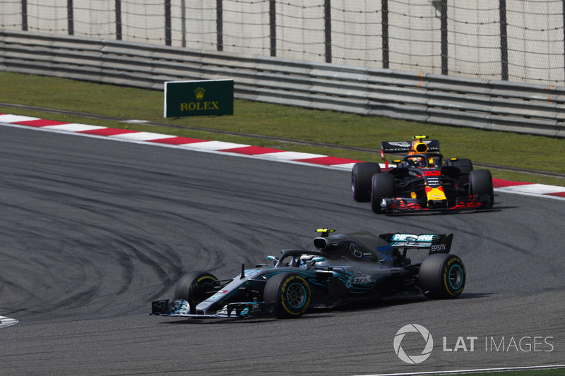 Valtteri Bottas, Mercedes AMG F1 W09, leads Max Verstappen, Red Bull Racing RB14 Tag Heuer