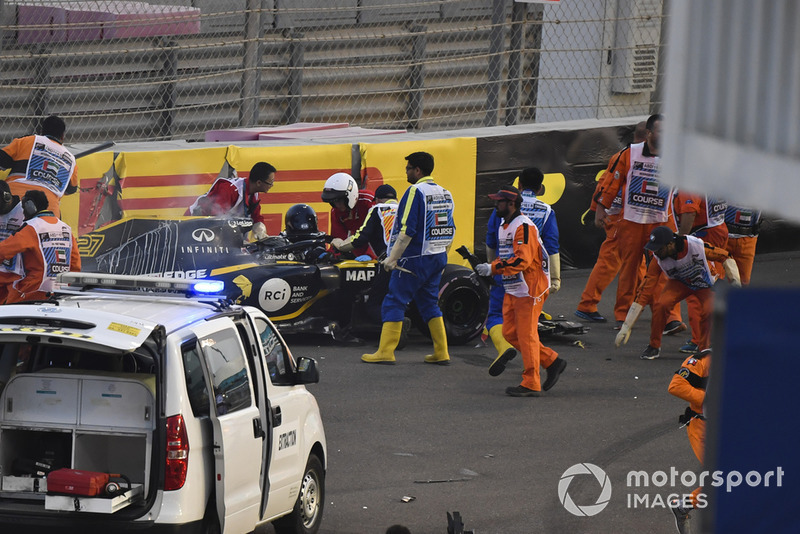 Medics and marshals assist Nico Hulkenberg, Renault Sport F1 Team R.S. 18 who crashed and rolled on lap one 