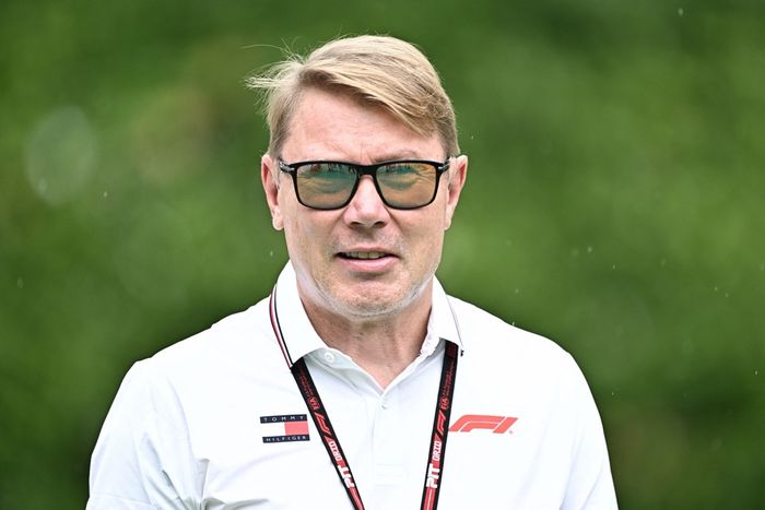 Mika Hakkinen arrives at the paddock 