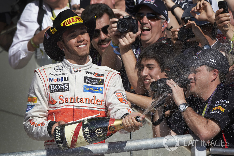 Podium: Race winner Lewis Hamilton, McLaren