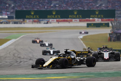 Nico Hulkenberg, Renault Sport F1 Team R.S. 18, leads Romain Grosjean, Haas F1 Team VF-18