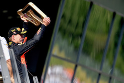 Race winner Max Verstappen, Red Bull Racing celebrates on the podium with the trophy