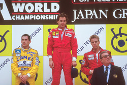 Podium: race winner Gerhard Berger, Ferrari, second place Ayrton Senna, Team Lotus, third place Stefan Johansson, McLaren, with Jean-Marie Balestre, FIA President