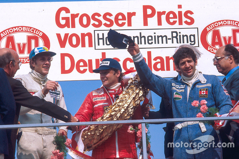 Niki Lauda, 1st position, Jody Scheckter, 2nd position and Hans-Joachim Stuck, 3rd position on the p