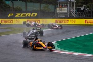 Daniel Ricciardo, McLaren MCL36, Yuki Tsunoda, AlphaTauri AT03, Mick Schumacher, Haas VF-22, Kevin Magnussen, Haas VF-22