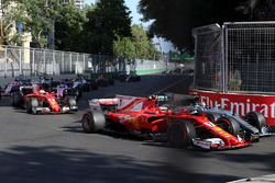 Kimi Raikkonen, Ferrari SF70H battles, Valtteri Bottas, Mercedes AMG F1 F1 W08 for position and col