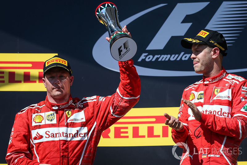 Podium: race winner Sebastian Vettel, Ferrari, second place Kimi Raikkonen, Ferrari