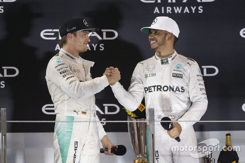 World Champion Nico Rosberg, Mercedes AMG F1 shakes hands with team mate and race winner Lewis Hamil