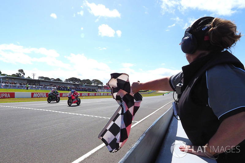 Marco Melandri, Aruba.it Racing-Ducati SBK Team takes chequered flag from Jonathan Rea, Kawasaki Racing Courtesy of WorldSBK