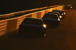 Race action at sunset