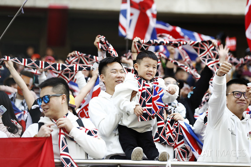 Chinese fans show their allegiance to Lewis Hamilton, Mercedes AMG F1, by wearing Union Jack colours