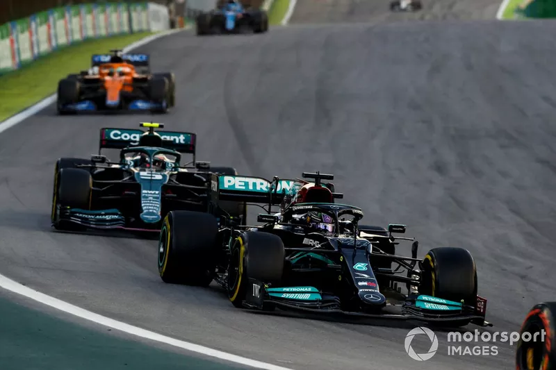 Lewis Hamilton, Mercedes W12, Sebastian Vettel, Aston Martin AMR21, and Daniel Ricciardo, McLaren MCL35M