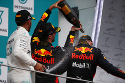 Lewis Hamilton, Mercedes AMG F1, Daniel Ricciardo, Red Bull Racing, spray champagne over winner Max Verstappen, Red Bull Racing, on the podium