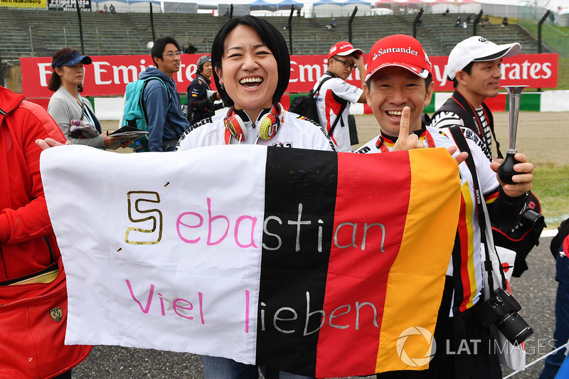 Sebastian Vettel, Ferrari fans and banner