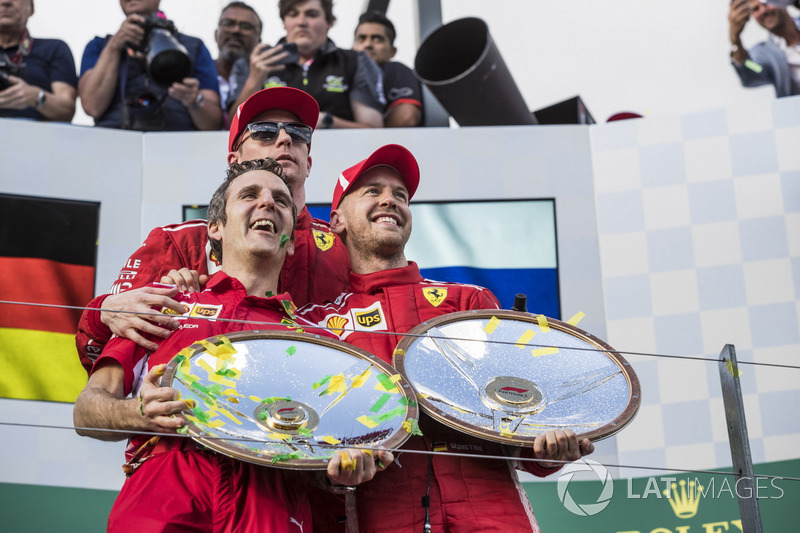 Inaki Rueda, Ferrari Race Strategist, Sebastian Vettel, Ferrari and Kimi Raikkonen, Ferrari celebrate on the podium with the trophies