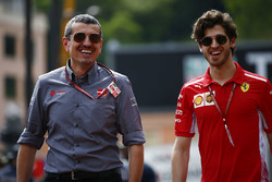 Guenther Steiner, Team Principal, Haas F1, and Antonio Giovinazzi, Ferrari development driver