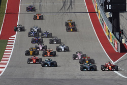 Lewis Hamilton, Mercedes AMG F1 W08, battles with Sebastian Vettel, Ferrari SF70H, ahead of the rest of the field