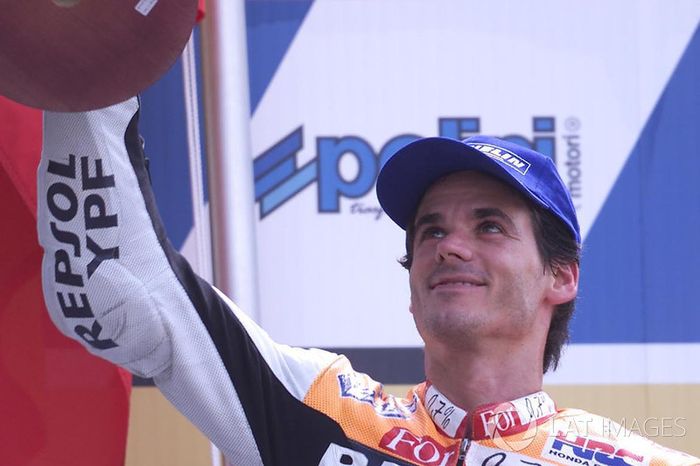 Podio: 1º Alex Criville, 2º Norick Abe, 3º Valentino Rossi