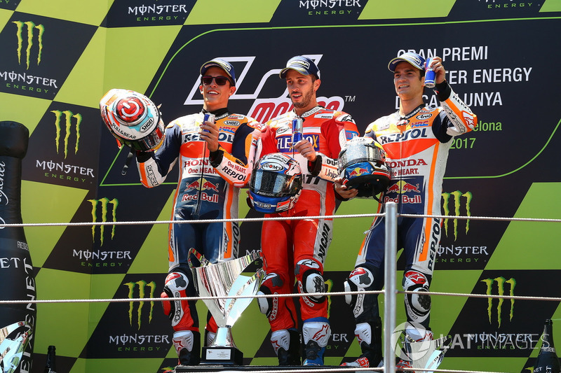 Le podium : le vainqueur Dovizioso devance Márquez et Pedrosa