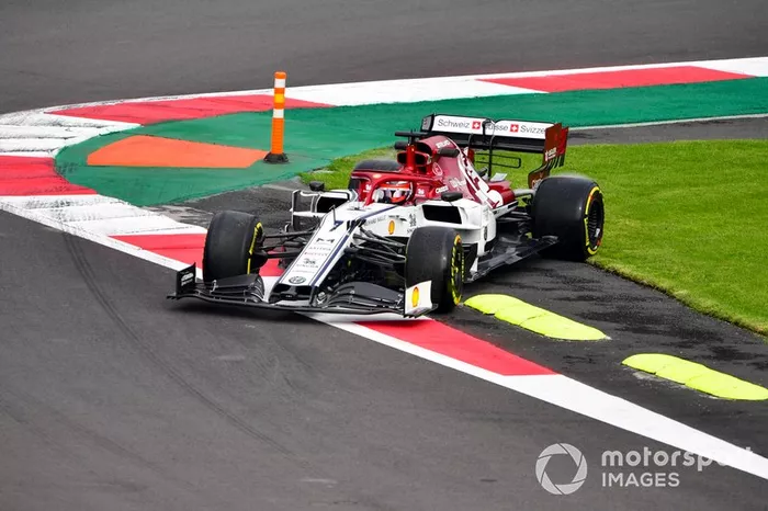 Kimi Raikkonen, Alfa Romeo Racing C38 runs over the grass