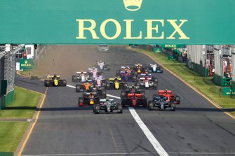 Valtteri Bottas, Mercedes AMG W10, leads Lewis Hamilton, Mercedes AMG F1 W10, Sebastian Vettel, Ferrari SF90, Charles Leclerc, Ferrari SF90, Max Verstappen, Red Bull Racing RB15, and the rest of the field at the start as Daniel Ricciardo, Renault F1 Team R.S.19, damages his front wing