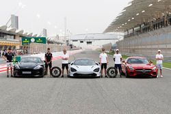 Max Verstappen, Red Bull Racing, Daniel Ricciardo, Red Bull Racing, with the Aston Martin Vanquish S