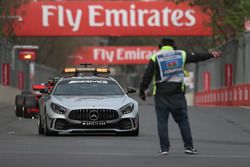 Safety car leads the field and marshal