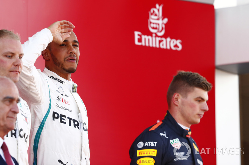 Lewis Hamilton, Mercedes AMG F1, celebrates victory on the podium with Valtteri Bottas, Mercedes AMG F1 and Max Verstappen, Red Bull Racing