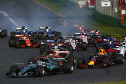 Valtteri Bottas, Mercedes AMG F1 W08, leads Max Verstappen, Red Bull Racing RB13, Kimi Raikkonen, Fe