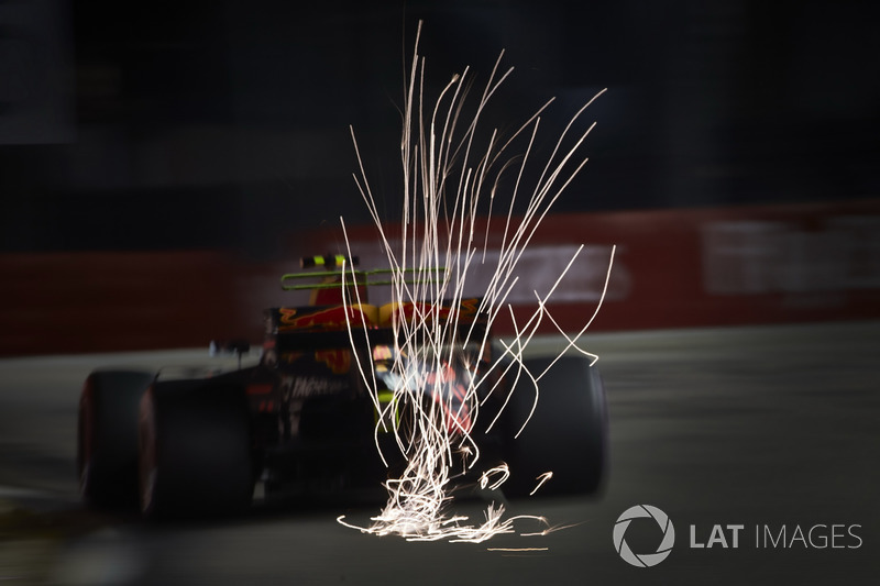 Max Verstappen, Red Bull Racing RB13, kicks up some sparks