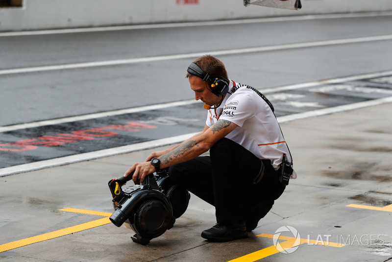 A McLaren engineer with some brake coolers