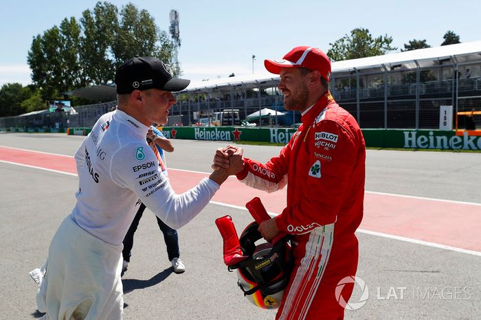 Valtteri Bottas, Mercedes AMG F1, y Sebastian Vettel, Ferrari