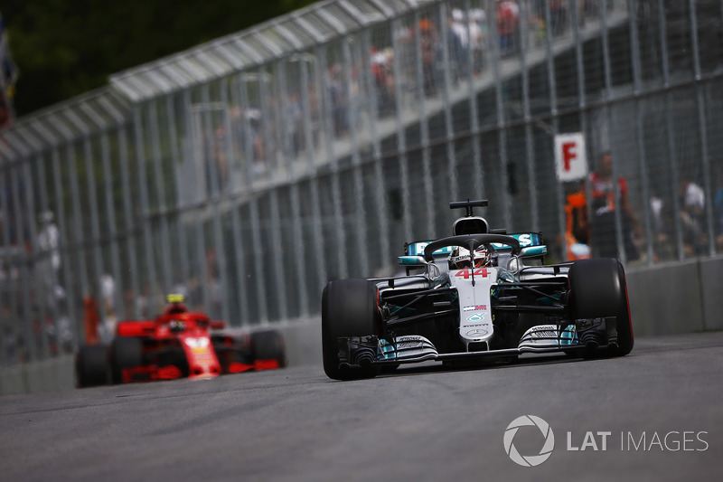 Lewis Hamilton, Mercedes AMG F1 W09, leads Kimi Raikkonen, Ferrari SF71H