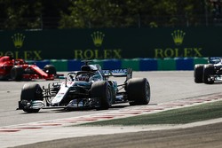 Lewis Hamilton, Mercedes AMG F1 W09, leads Valtteri Bottas, Mercedes AMG F1 W09, and Sebastian Vettel, Ferrari SF71H