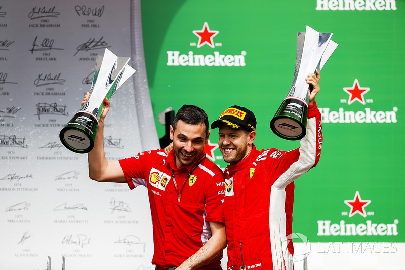 Nicola Bariselli, Race Engineer, Ferrari, and Sebastian Vettel, Ferrari, 1st position, with the winn