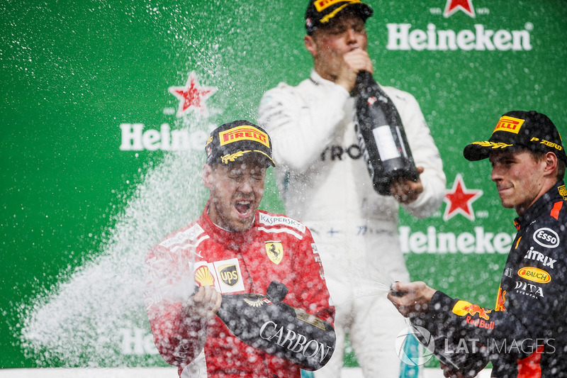 Valtteri Bottas, Mercedes AMG F1, 2nd position, Sebastian Vettel, Ferrari, 1st position, and Max Ver