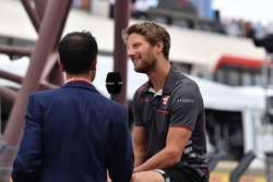 Romain Grosjean, Haas F1 is interviewed on the drivers parade