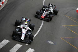 Sergey Sirotkin, Williams FW41, leads Romain Grosjean, Haas F1 Team VF-18