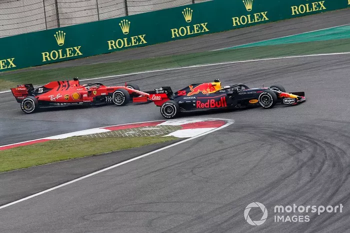 Sebastian Vettel, Ferrari SF90 and Max Verstappen, Red Bull Racing RB15 battle 