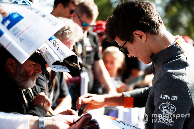 Lando Norris, McLaren signs autographs for fans