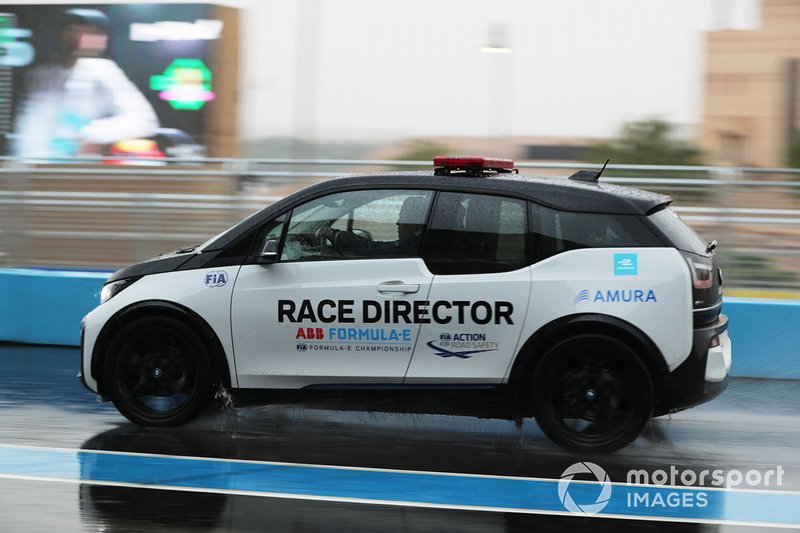 The Race Director's car on a wet track