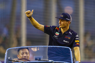 Max Verstappen, Red Bull Racing, waves from a Morgan on the drivers' parade