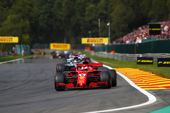Sebastian Vettel, Ferrari SF71H, leads Lewis Hamilton, Mercedes AMG F1 W09
