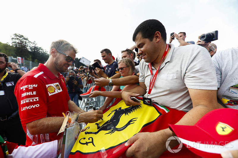 Sebastian Vettel, Ferrari, signs autographs for fans