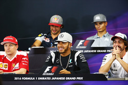 (L to R): Kimi Raikkonen, Ferrari; ljp; and Fernando Alonso, McLaren in the FIA Press Conference