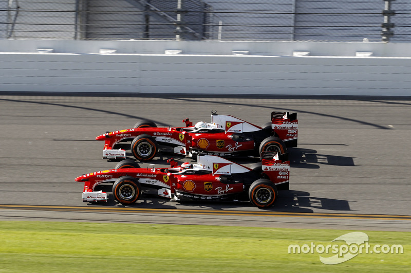 Kimi Raikkonen, Ferrari F60 et Sebastian Vettel, Ferrari F60