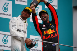 Podium: third place Daniel Ricciardo, Red Bull Racing, sprays champagne over second place Lewis Hamilton, Mercedes AMG F1