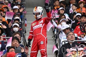 A fan dressed as Sebastian Vettel